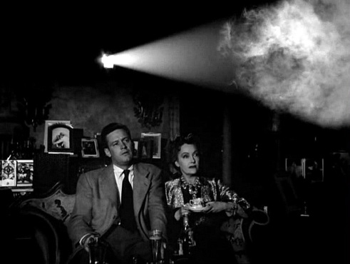 Joe Gillis (William Holden) and Norma Desmond (Gloria Swanson) yearning for the Hollywood spotlight in Sunset Boulevard.